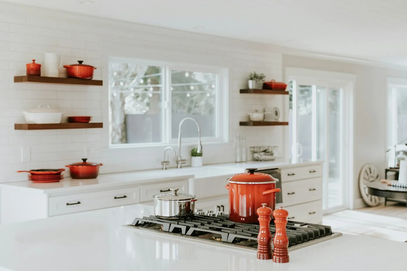 Full size kitchen in a furnished rental with cookware provided